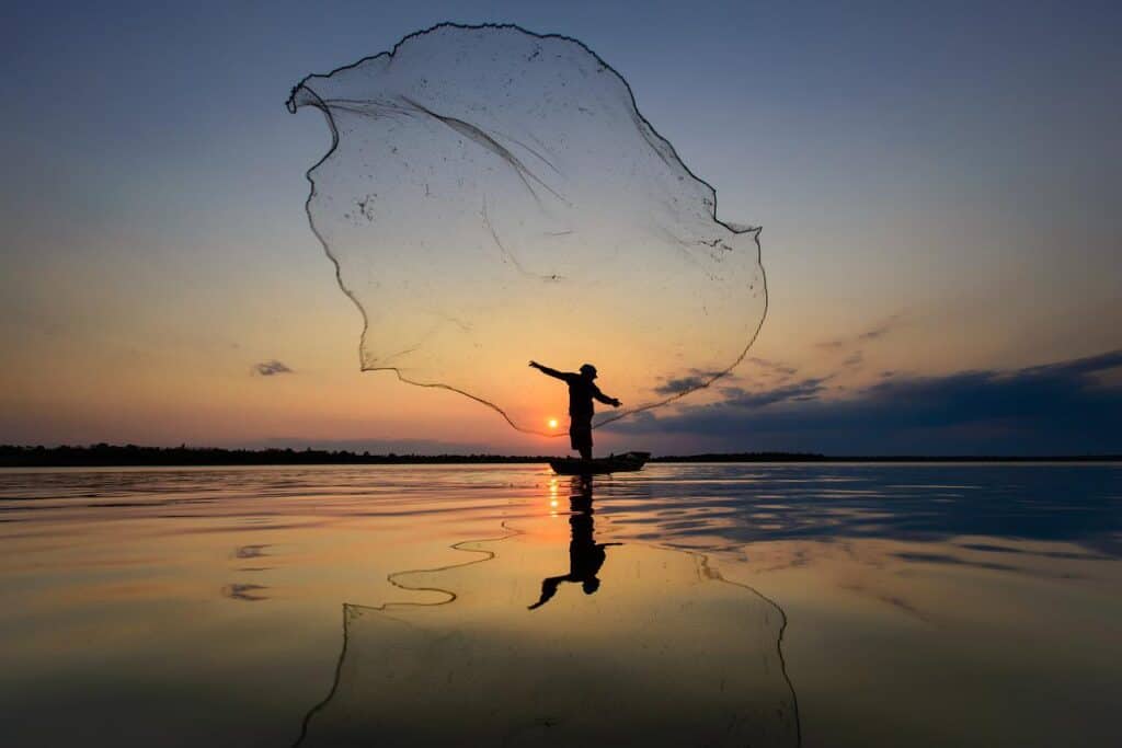 man, fishing net, lake-6342662.jpg